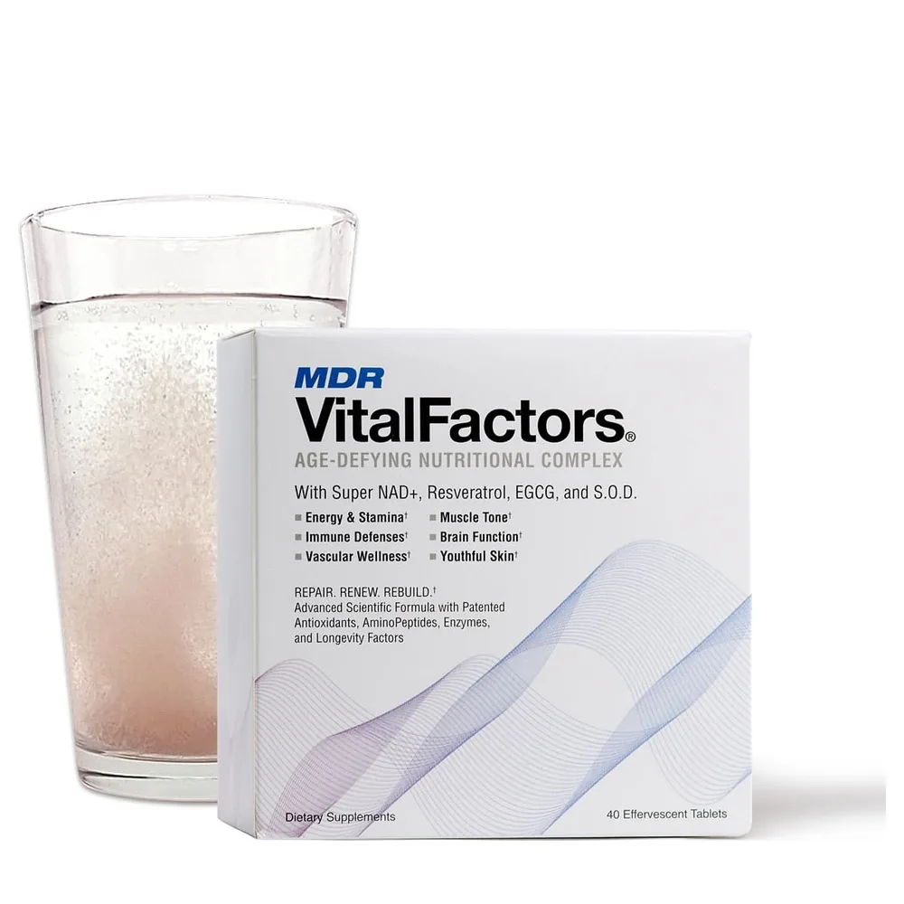 VitalFactors effervescent tablet fizzing in a glass of water