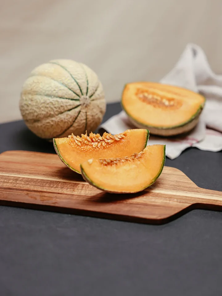 A cantaloupe melon cut into slices